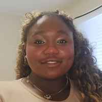 Headshot of Enny Oshile